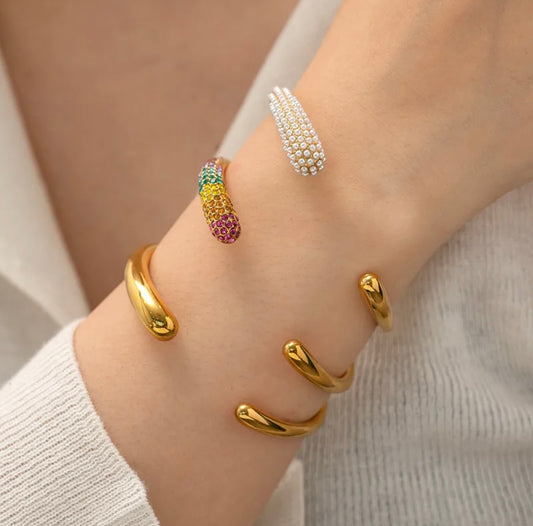 Chic Cuff Bracelet - Rainbow Rhinestone, Plain Gold, and Pearl Detailing